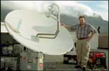 Ben poses with the satellite uplink dish